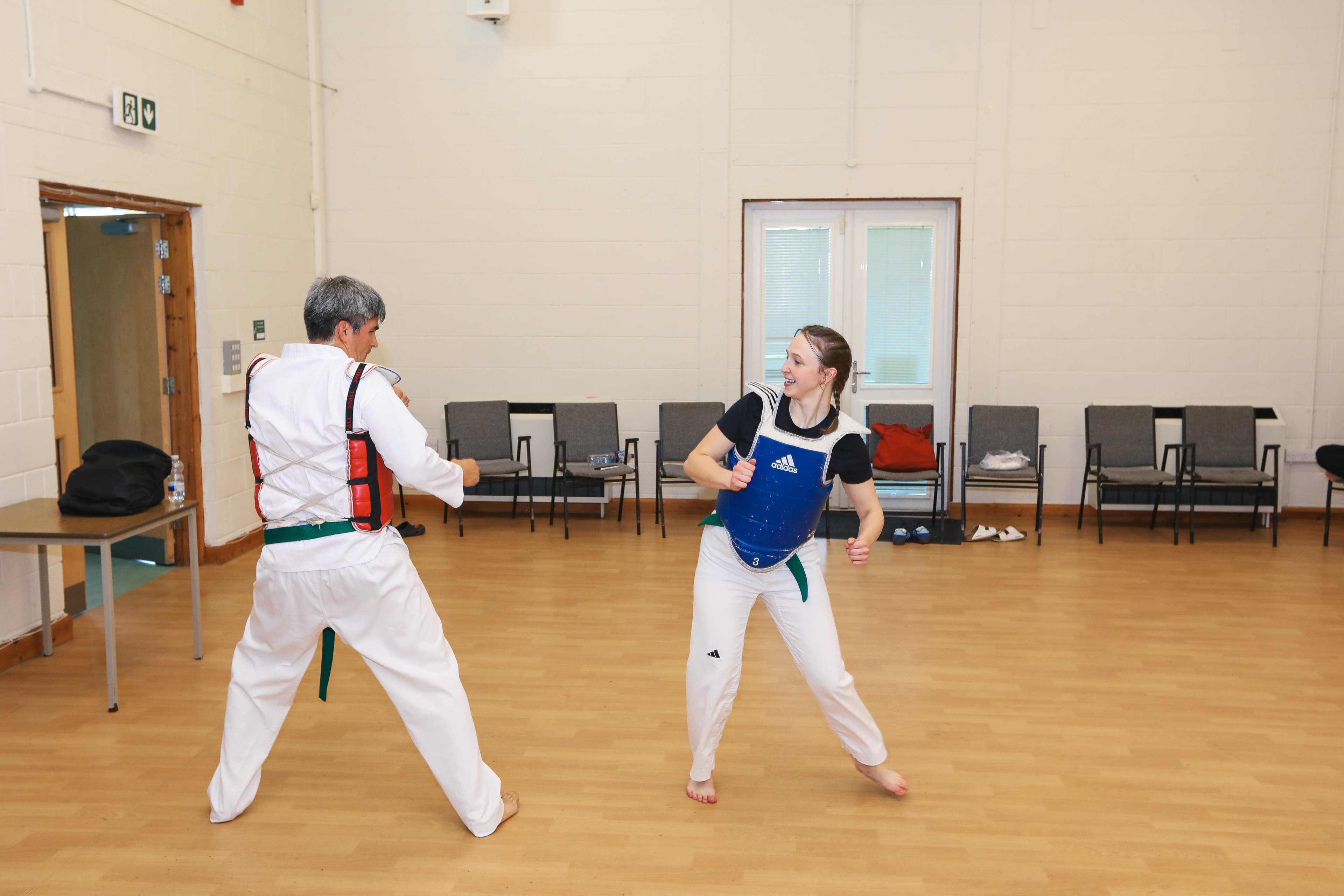 Adults doing pad work and application drills at Vortex Martial Arts Academy in Lancaster