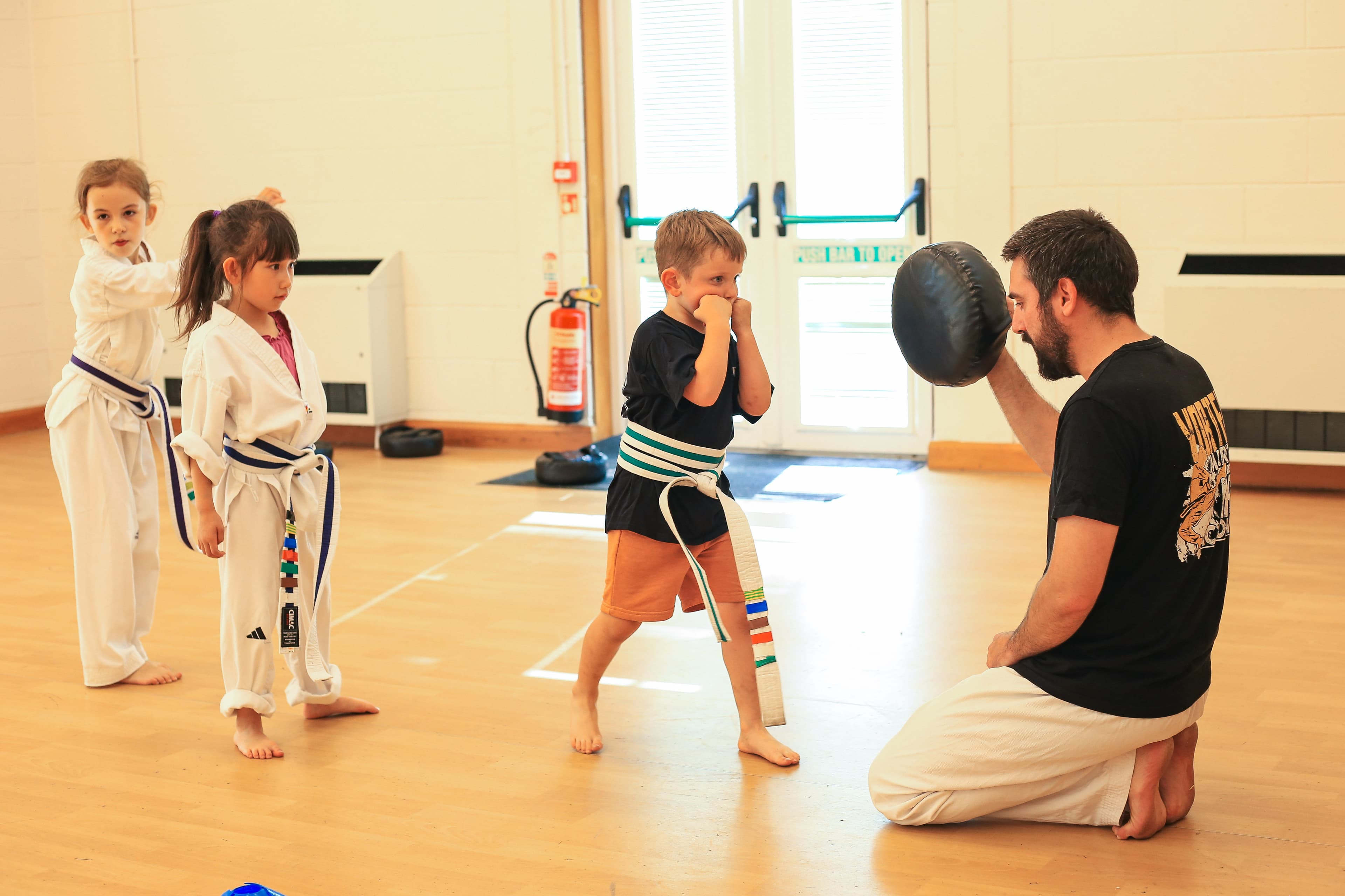 A new starter learns Taekwondo technique at Vortex Martial Arts Academy in Lancaster