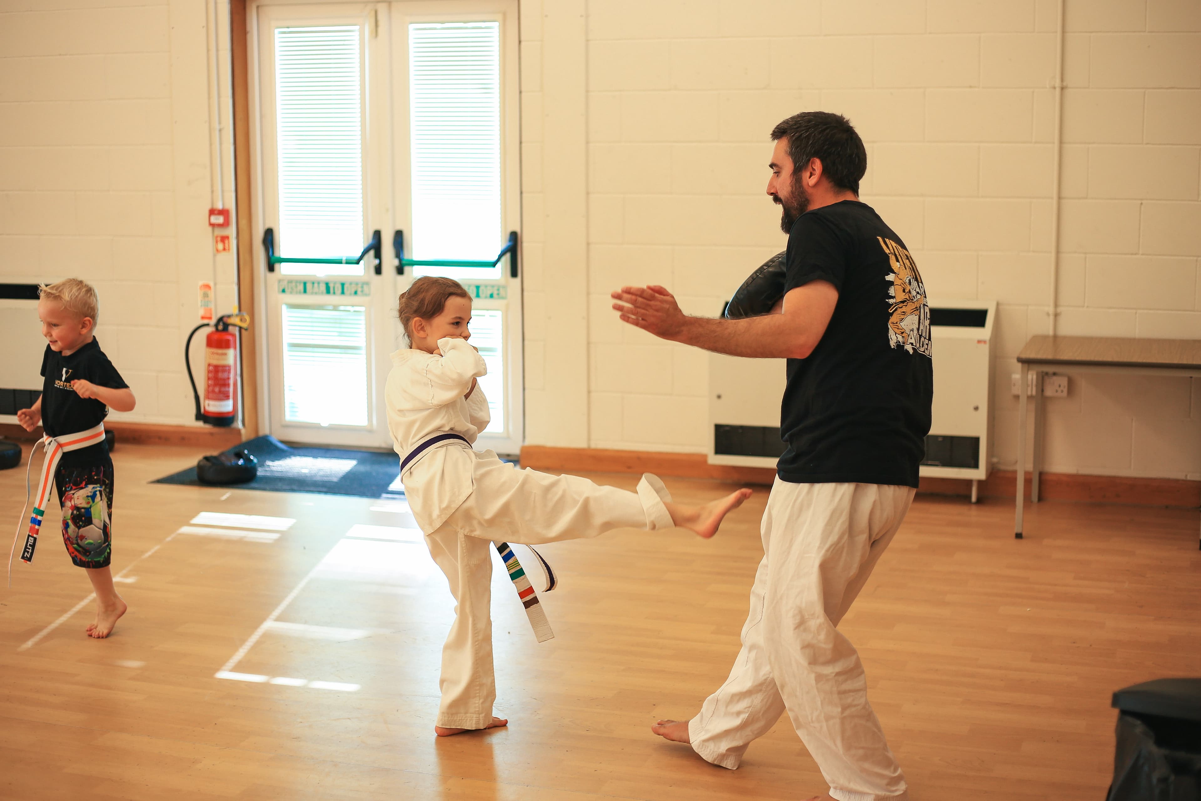 Cadets students doing pad work at Vortex Martial Arts Academy in Lancaster