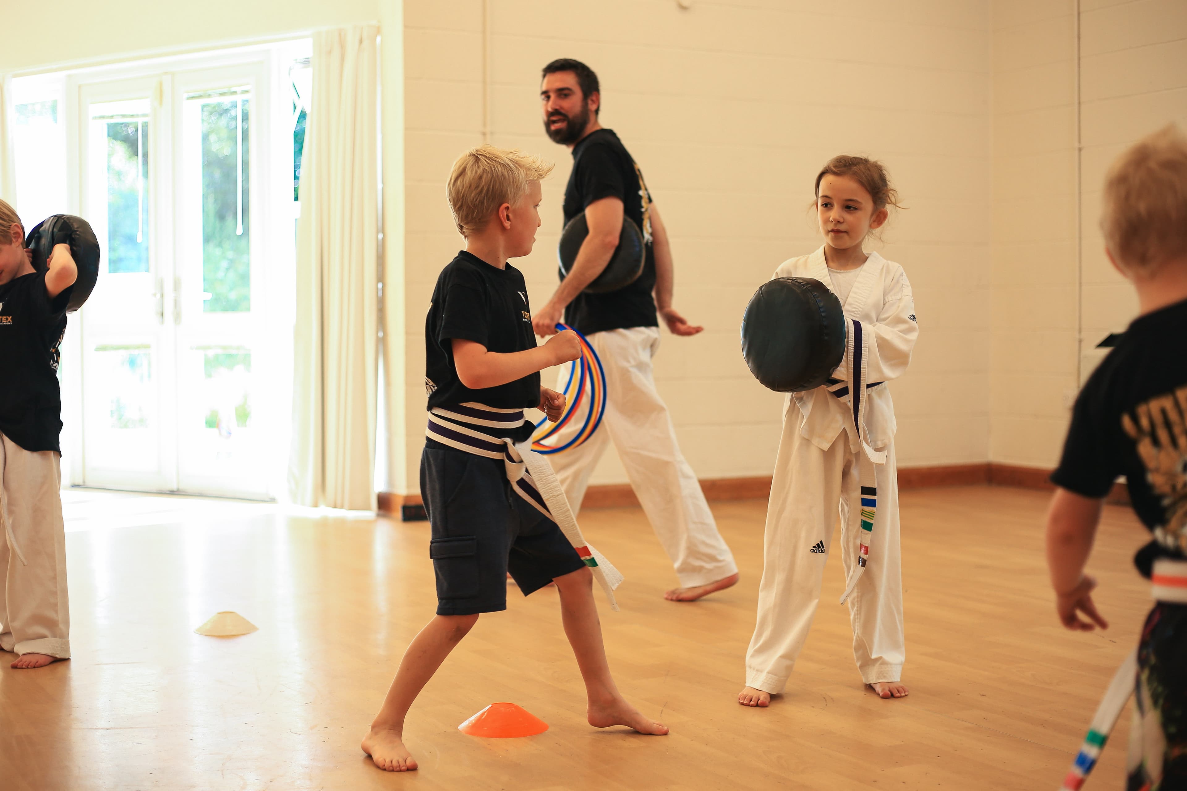 A Cadets student drilling Taekwondo technique at Vortex Martial Arts Academy in Lancaster