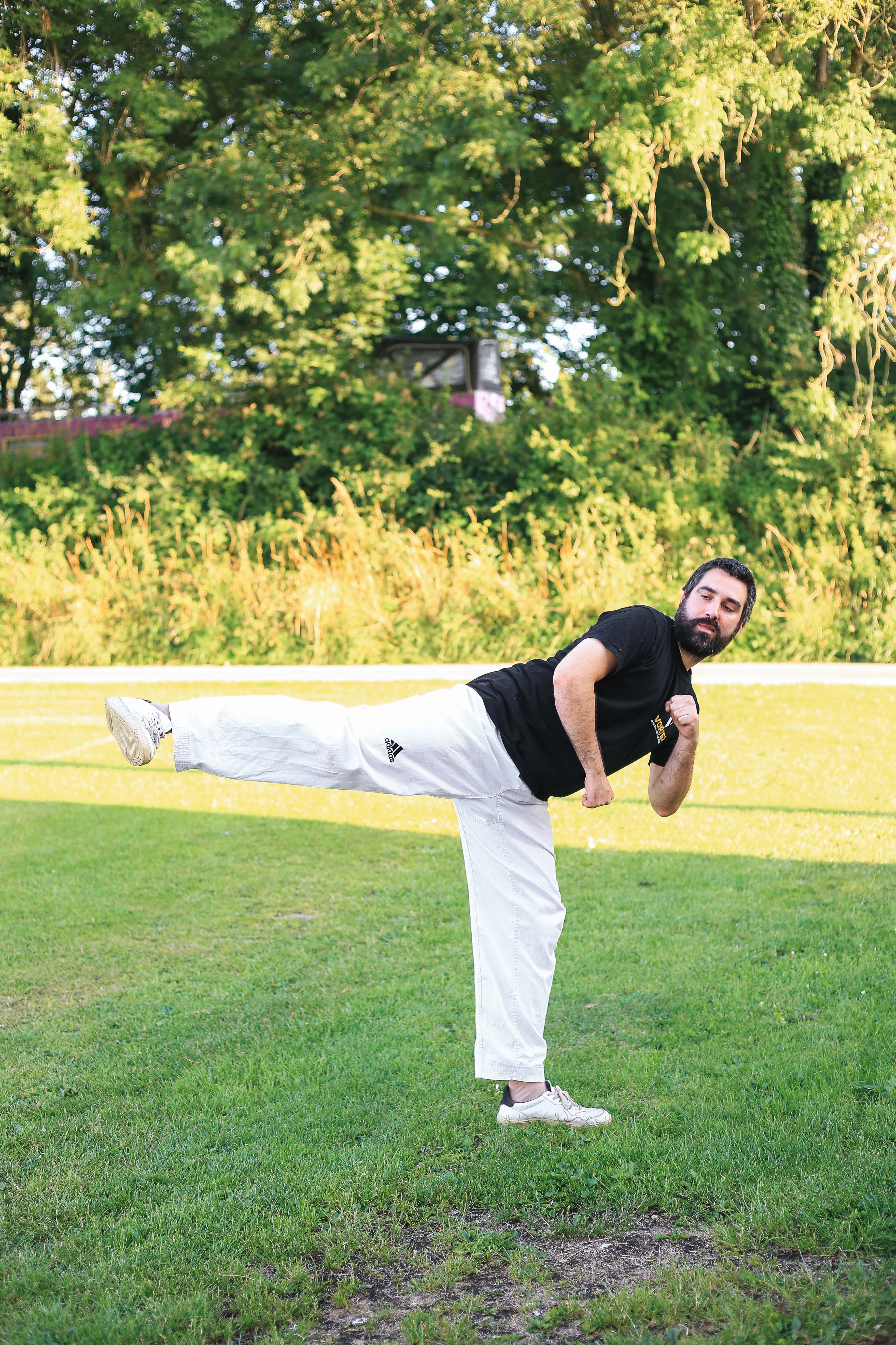 Andy Griffiths performing an outdoor side-kick. First class free at Vortex Martial Arts Academy