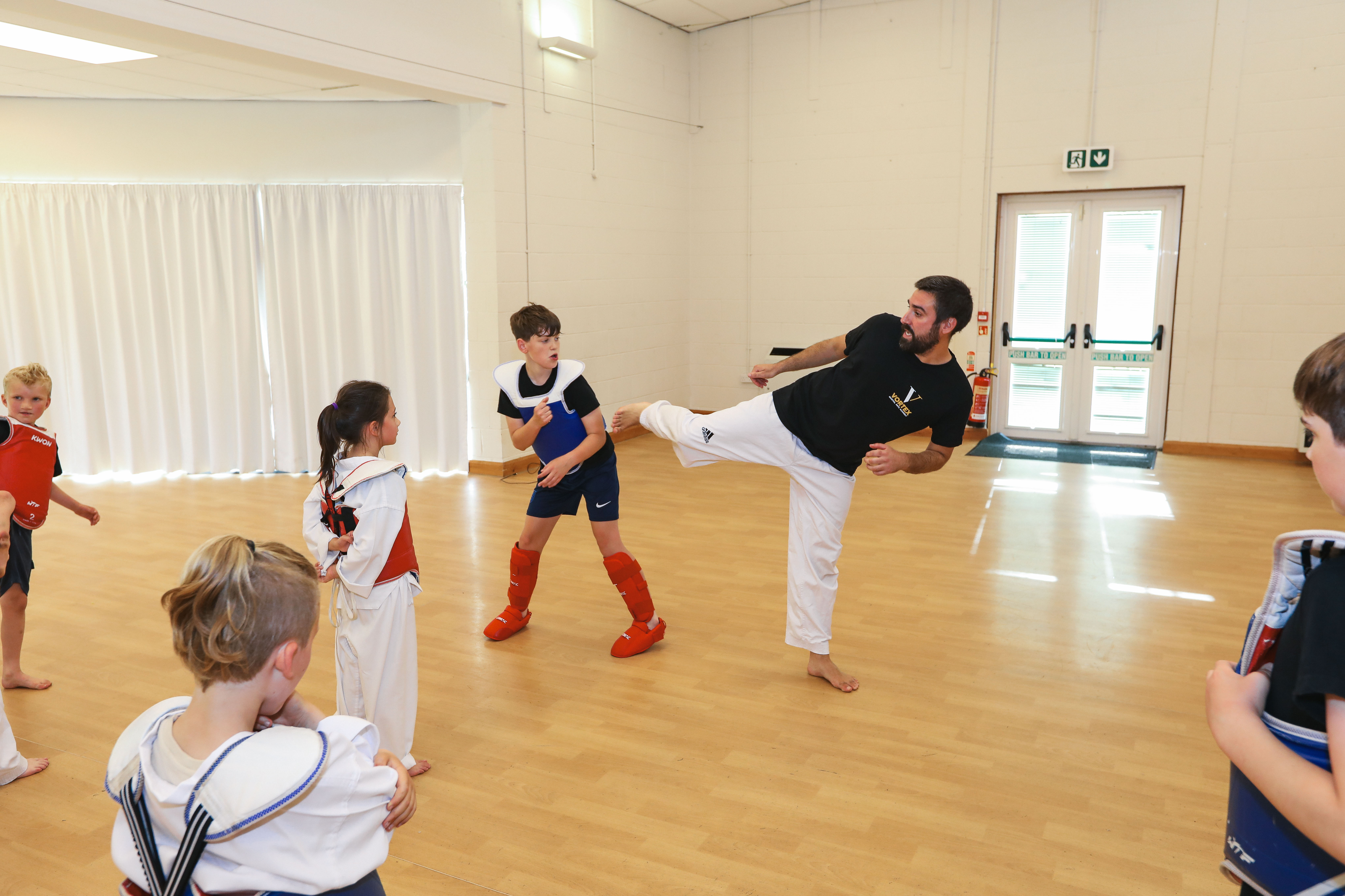 Andy Griffiths demonstrating a side-kick at Vortex Martial Arts Academy
